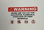 DECAL - WARNING NEVER USE THIS UNIT HAZARDOUS, FLAMMABLE, CORROSIVE, OR TOXIC MATERIAL